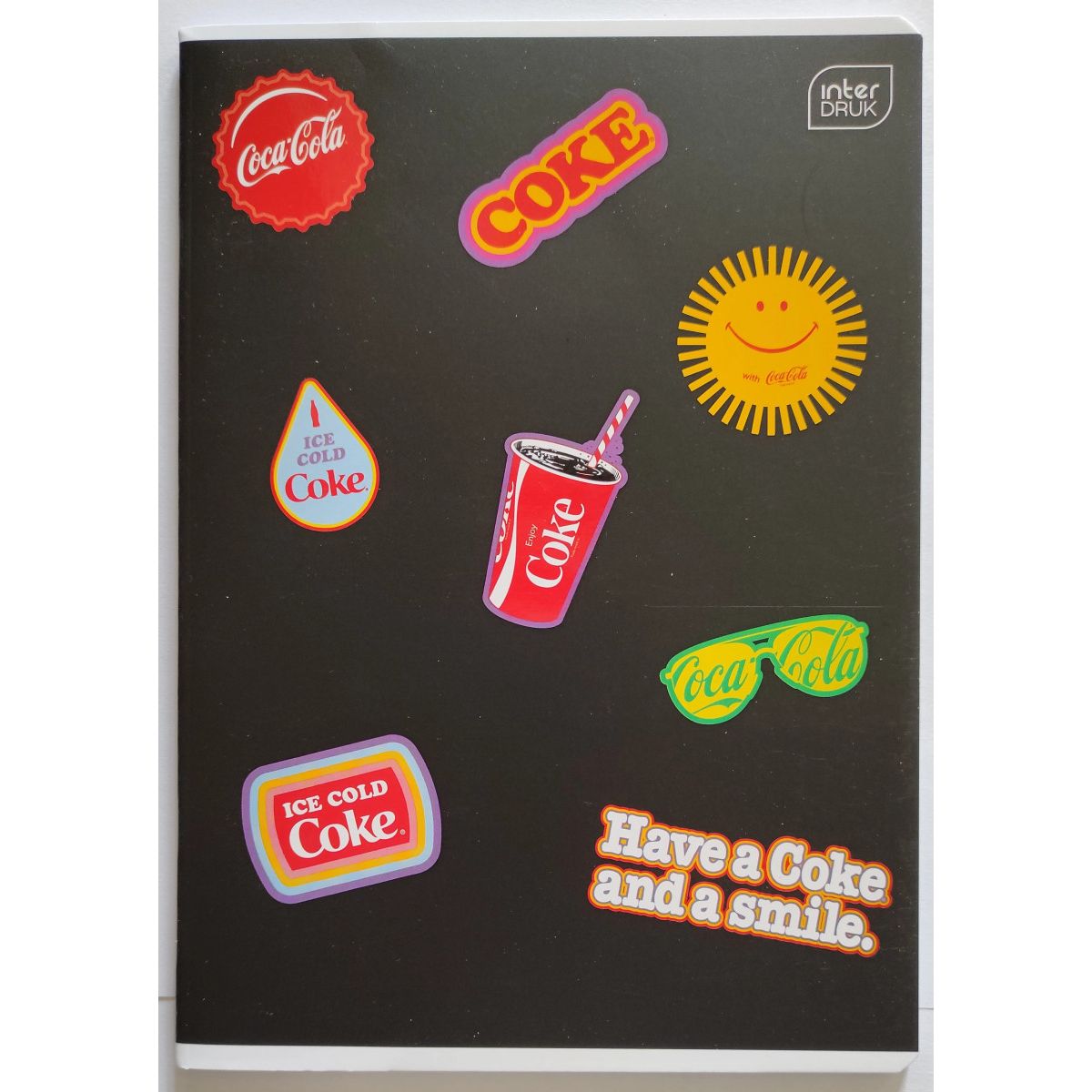 Zeszyt COCA COLA MAT+UV A5 32k. 70g trzy linie Interdruk